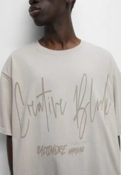 PULL & BEAR Short Sleeve With SloganT-Shirt Con StampaTaupe Uomo T-shirt E Polo PUC22O1P7-B11 -Pull & Bear 47ffd4cbc4c949a2ab10bdd78d5edc79