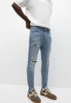 PULL & BEAR Ripped Carrot FitJeans Tapered FitLight Blue Denim Uomo Jeans PUC22G0NI-K12