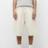 PULL & BEAR Baggy Fit Wide-Leg-Bermuda Shorts Di JeansBeige Uomo Jeans PUC22F0DH-B11